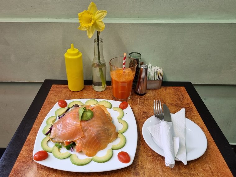Smoked salmon, cucumber and egg salad with orange juice